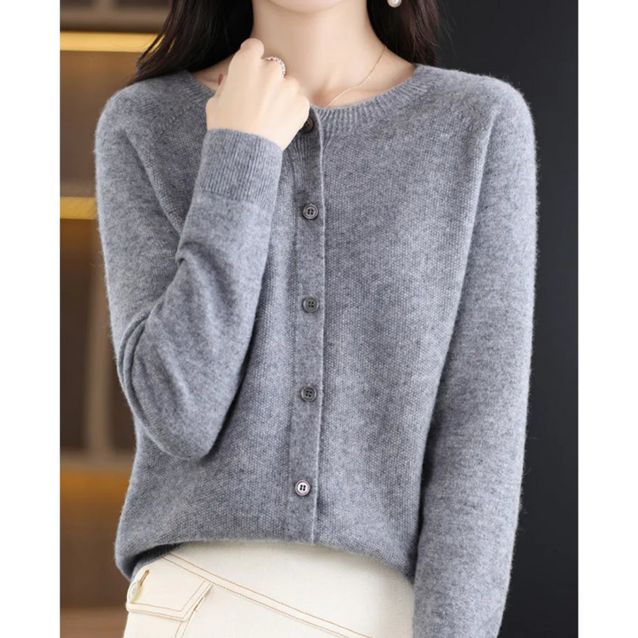 Dam cardigan med knappar och långa ärmar i enkel design