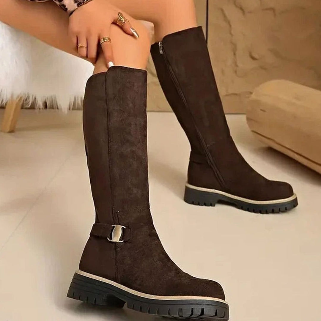 Dam knähög stövlar med spänne, dragkedja, och profil sula
