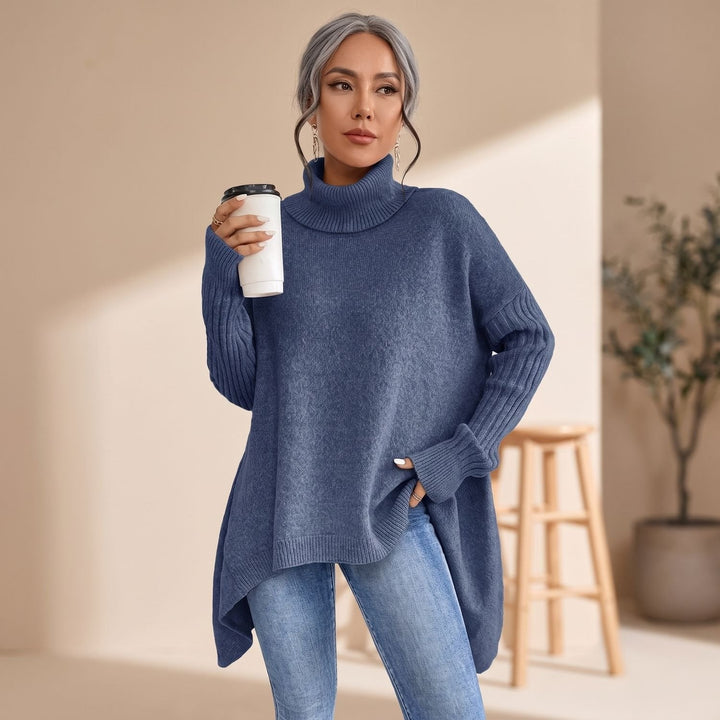 Dam oversized polotröja i kashmirstickning med långa ärmar