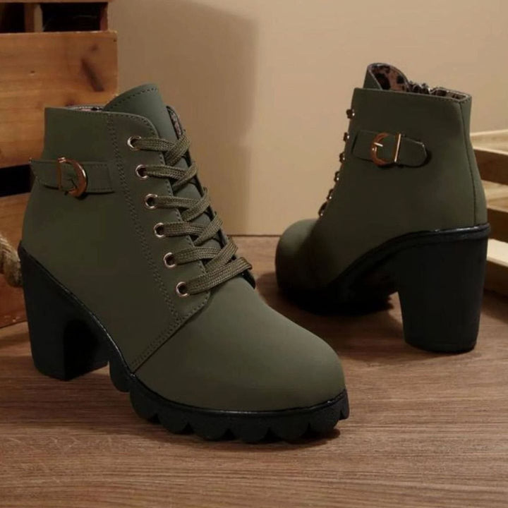 Dam med snörning ankelboots med blockklack och profil sula