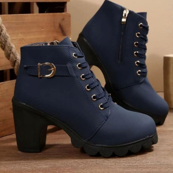 Dam med snörning ankelboots med blockklack och profil sula