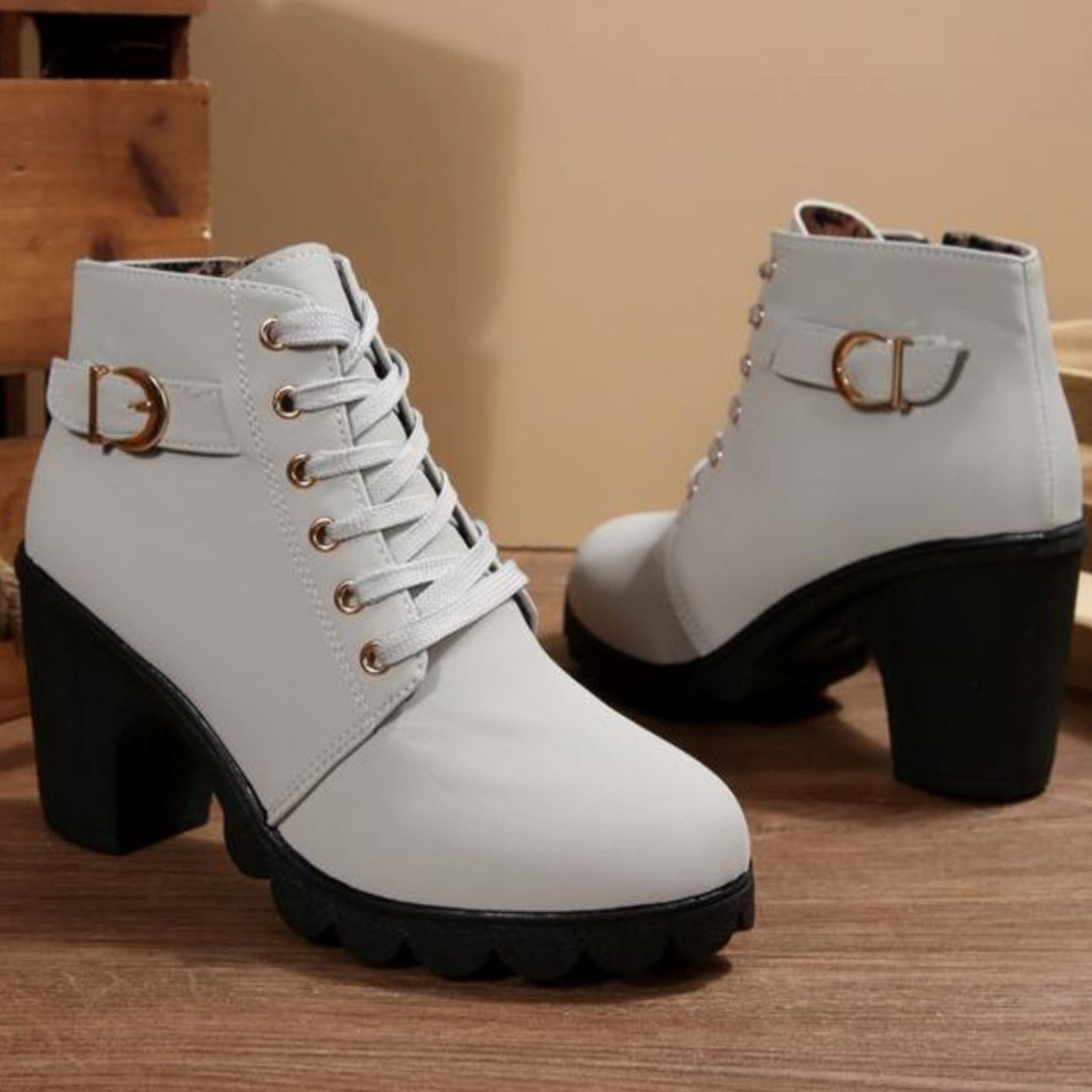 Dam med snörning ankelboots med blockklack och profil sula